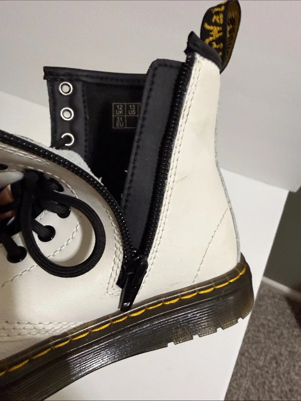 Dr. Martens Kids White Leather Ankle Boots with Black Accents